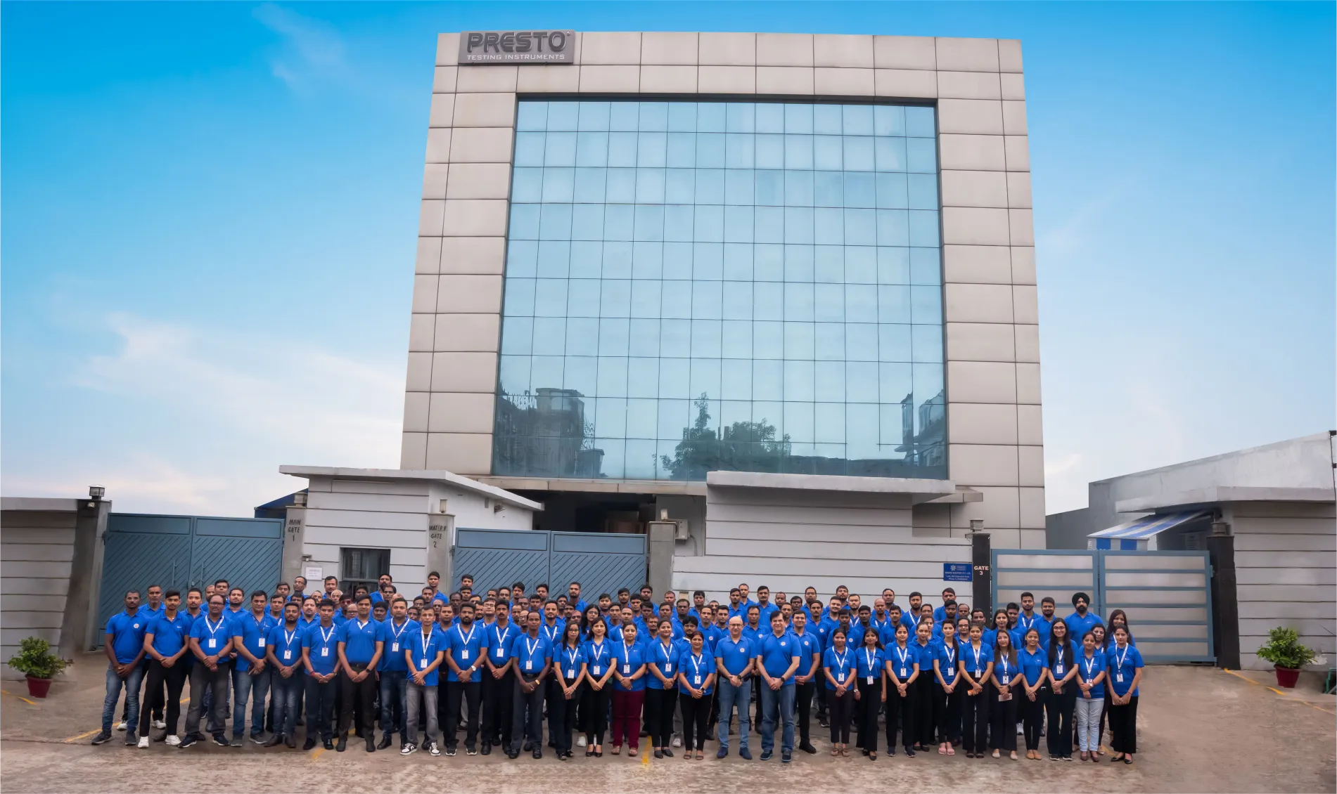 Presto employees in front of building